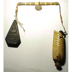 Afghanistan, c. 1840, a jerry-rigged powder scale with ivory balance beam, a chevron decorated i...