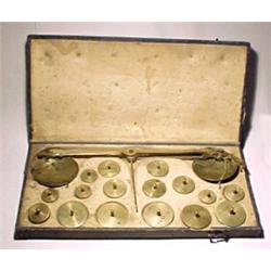 Germany, Berlin, c. 1850, a leather boxed coin scale with sixteen round knobbed weights each lab...