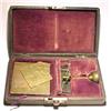 Image 1 : England, c. 1900, a yarn scale contained in a leather covered box and presented in a red velvet...