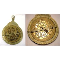 Persian, late 19th century brass astrolabe, the instrument is complete with four marked plates,...