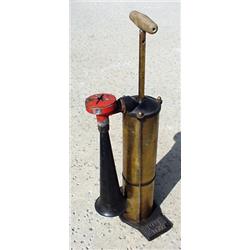 United States, c. 1920, a brass cylinder-shaped pump action fog horn with an iron horn which can...