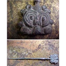 Iran, Luristan, c. 800 BC. a fine bronze pin surmounted by the head of a lion with target-shaped...