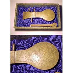 China, Ch'ing Dynasty, Kuang-Hsu Period, c. 1875 AD. a fine brass lock and key, in- cised on top...