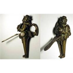 Persia, 17th century AD. a fine brass lock and key in the form of a soldier on guard duty. He ho...