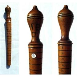 England, c. 1890, wood ring sizer with knobbed turned handle. The shaft with nineteen incised co...
