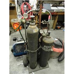 Tank Dolly With Torch Hose - Note: Unknown if tanks are rentals.