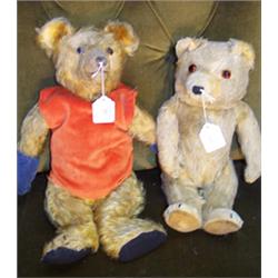 Vintage gold plush teddy bear, the paws and feet with three claws and velveteen pads, the interio...