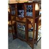 Image 1 : Liberty style inlaid mahogany display cabinet having an arch shaped central recess flanked by pai...