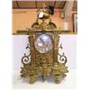 Image 1 : 19th Century French ormolu cased mantel clock having urn finial and mask head decoration, blue an...