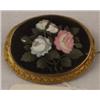Image 1 : 19th Century oval brooch set floral pietra dura panel within a gilt metal mount, the reverse with...