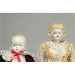 LOT OF TWO CHINA HEAD DOLLS.