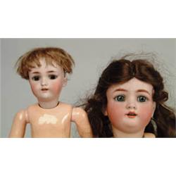 LOT OF 2 BISQUE SOCKET HEAD DOLLS.