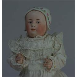 11" G. HEUBACH BISQUE SOCKET HEAD DOLL.