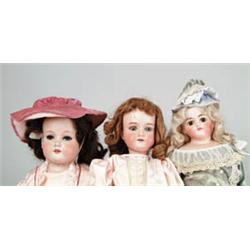 LOT OF 3 BISQUE HEAD DOLLS.