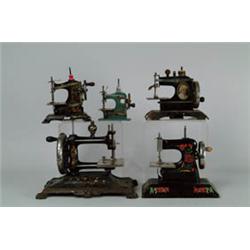 LOT OF FIVE CHILDREN'S TOY SEWING MACHINES. 