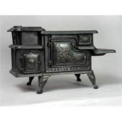 RARE SALESMAN SAMPLE CAST IRON COOK STOVE.