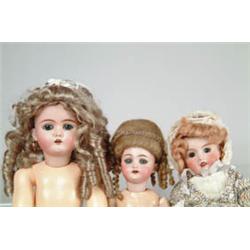 LOT OF 3 BISQUE SOCKET HEAD DOLLS.  