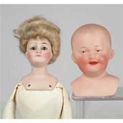 LOT OF 2 BISQUE SHOULDER HEADS.