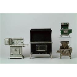 LOT OF FOUR DOLL COOK STOVES.   