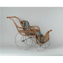 ORNAMENTAL VICTORIAN WICKER DOLL STROLLER.  