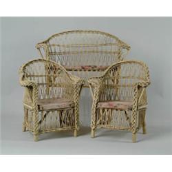 THREE-PIECE ORNATE WICKER DOLL'S PORCH SET.