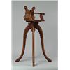 Image 1 : UNUSUAL DOLL'S OR SMALL CHILD'S OAK ORNAMENTAL HIGH CHAIR.