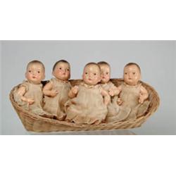 LOT OF FIVE IDENTICAL 7" COMPOSITION BABY DOLLS IN OVAL BASKET, UNMARKED.