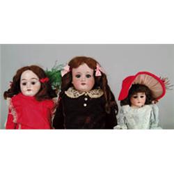 LOT OF 3 GERMAN BISQUE SHOULDER HEAD DOLLS WITH KID BODIES.
