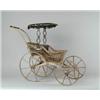 Image 1 : WICKER AND WOOD DOLL CARRIAGE.