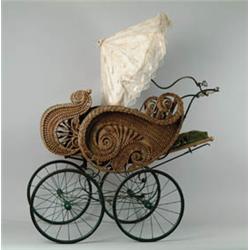 FINE WICKER UPHOLSTERED BABY CARRIAGE WITH PARASOL BY F.A. WHITNEY CARRIAGE CO.