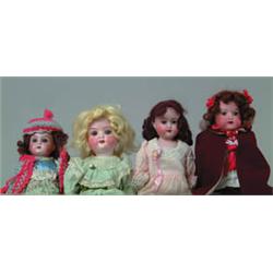 LOT OF 4 GERMAN BISQUE SHOULDER HEAD DOLLS WITH EXTRA KID BODY.