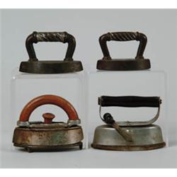 LOT OF NINE CHILD'S OR MINIATURE IRONS.