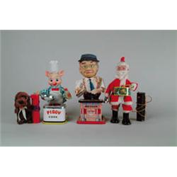 FOUR BATTERY OPERATED TOYS. 