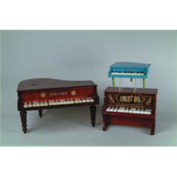 LOT OF THREE CHILDREN'S DOLL PIANOS.