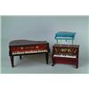 Image 1 : LOT OF THREE CHILDREN'S DOLL PIANOS.