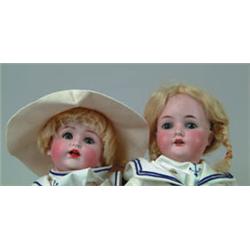 LOT OF 2 BISQUE SOCKET HEAD DOLLS.