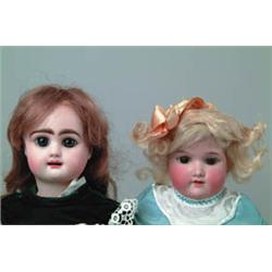 LOT OF 2 BISQUE SOCKET HEAD DOLLS.