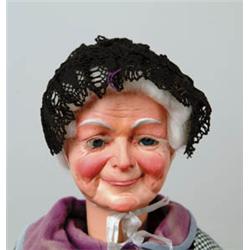 25" PAPIER-MÂCHÉ CLOCKWORK GRANDMOTHER DOLL