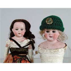 LOT OF 17 GERMAN BISQUE HEAD DOLLS. 