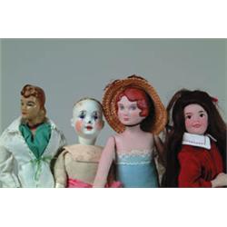 LOT OF 4 DOLLS.