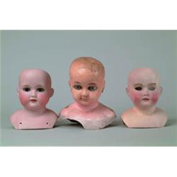 BOX LOT OF DOLL PARTS.