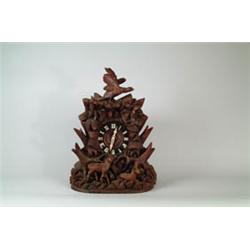 MAGNIFICENT BLACK FOREST CARVED WALNUT CUCKOO CLOCK.