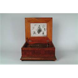 11" REGINA DISC PLAYING MUSIC BOX.