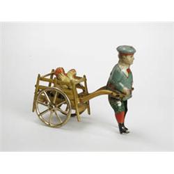 YOUTH PULLING CART CONTAINING HEN.