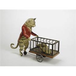 DRESSED CAT PUSHING WHEELED CAGE WITH MICE.