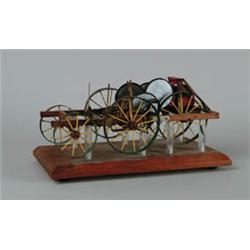 PATENT MODEL:  J.A. MOORE SPRING PROPELLED CARRIAGE.