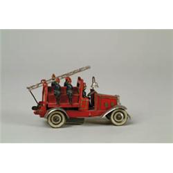 PENNY TOY WINDUP FIRE TRUCK.