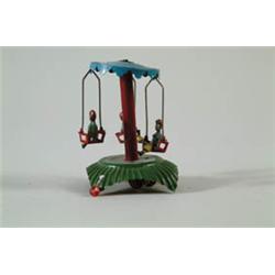 STRING OPERATED SWING PENNY TOY.
