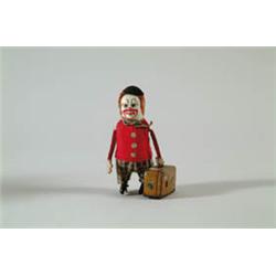 CLOWN WITH SUITCASE BY SCHUCO.