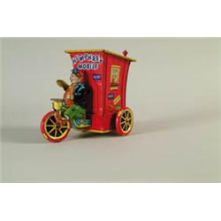 TIN W/UP HUMPHREY MOBILE.